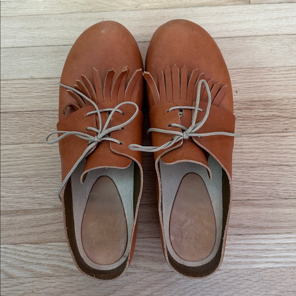 Bryr Tan Leather Mules with Fringe Detail